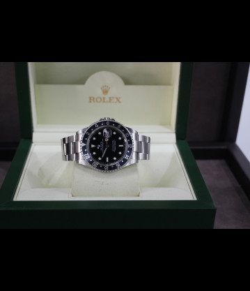 Rolex Gmt II Ref.16710 40mm Bisel negro año 2005 caja sin agujeros full set.