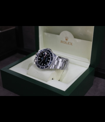 Rolex Gmt II Ref.16710 40mm Bisel negro año 2005 caja sin agujeros full set.