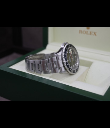 Rolex Gmt II Ref.16710 40mm Bisel negro año 2005 caja sin agujeros full set.
